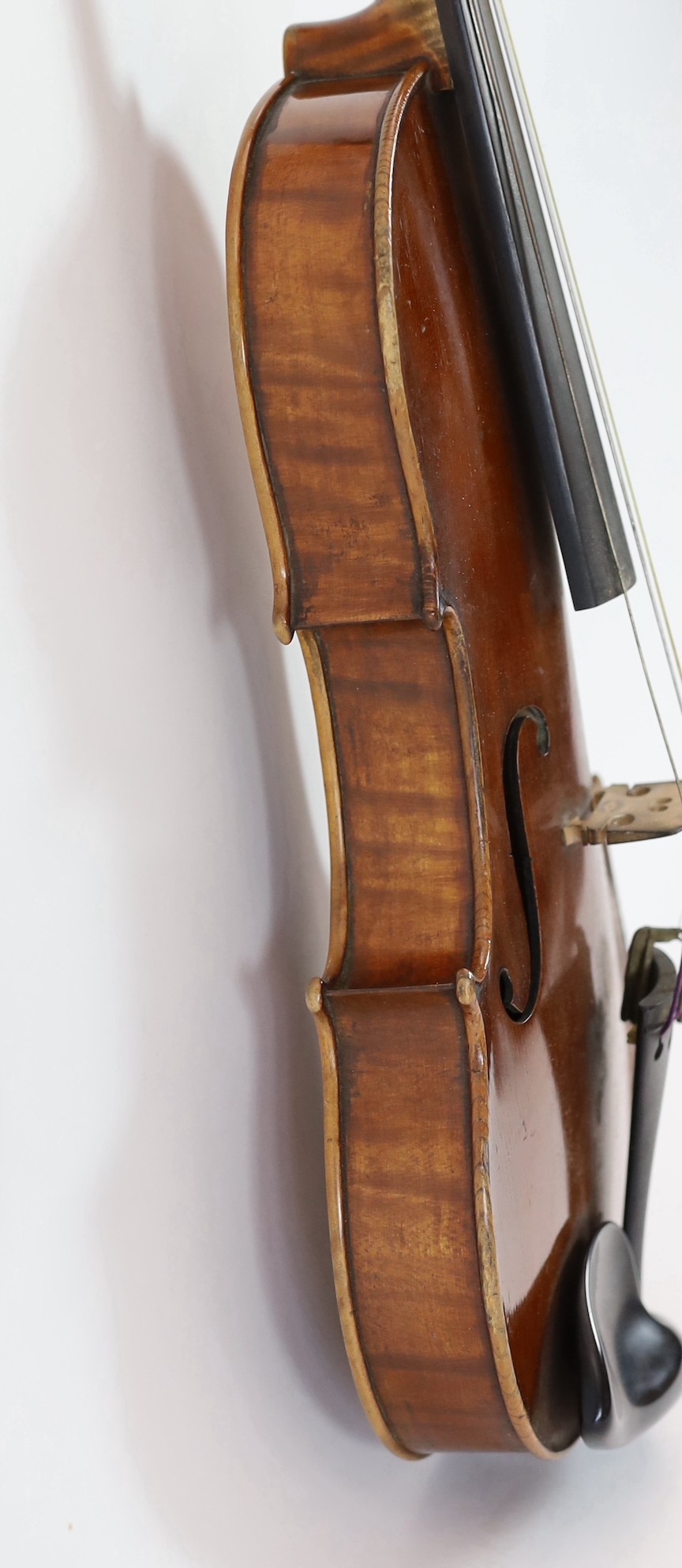 A violin, labelled Leandro Bisiach della Scuola Cremonese fece in Milano 1898, Piazzo del Duomo, length of back 35.6 cm (14in.) cased
